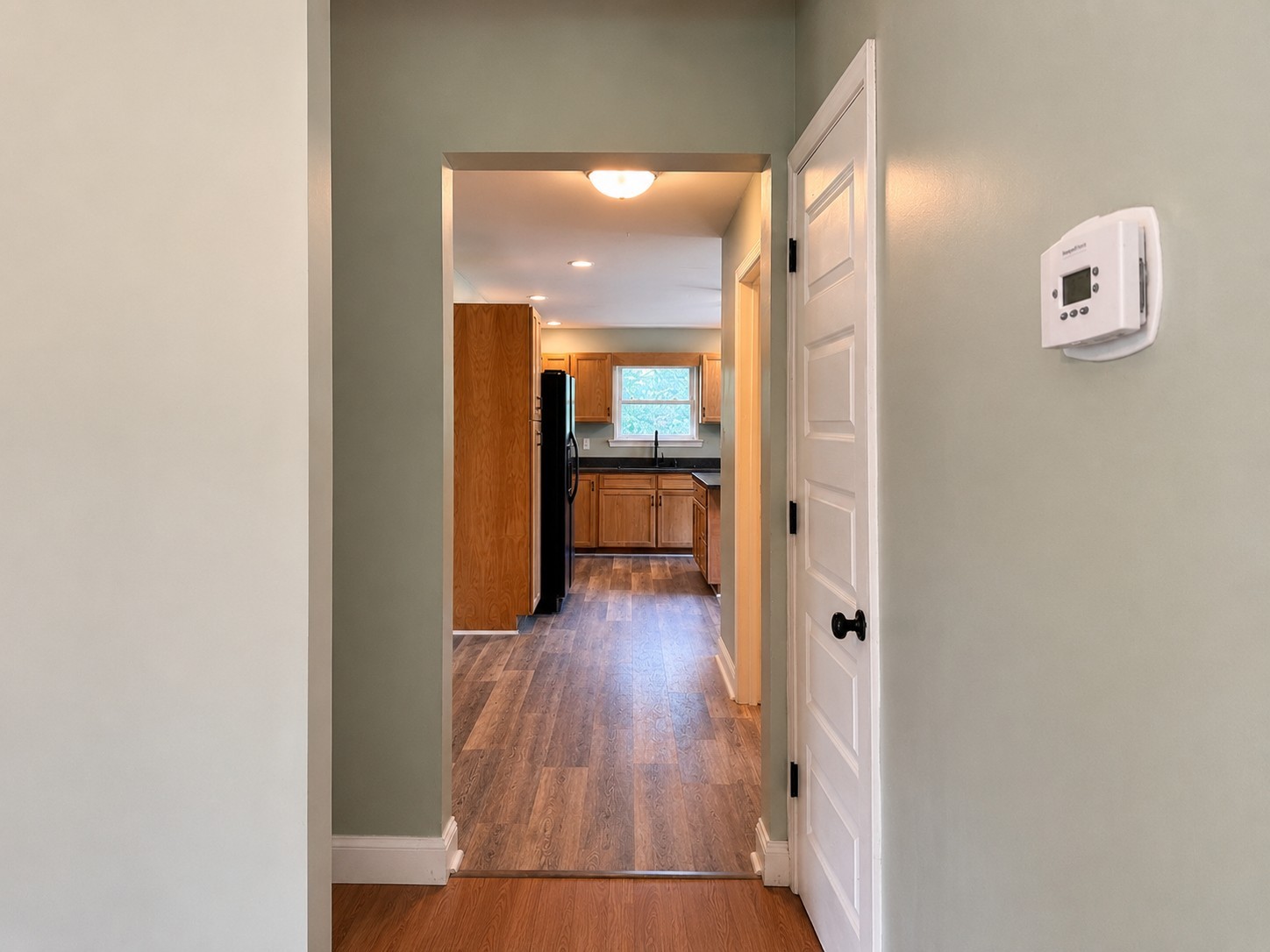352 Main Street Cerulean, KY 42215 - Photo 17 of 32 a view of a hallway with wooden floor and closet