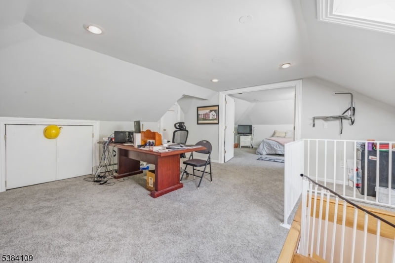 207 Eileen Drive Cedar Grove, NJ 07009 - Photo 20 of 26 a view of a workspace with furniture and toys