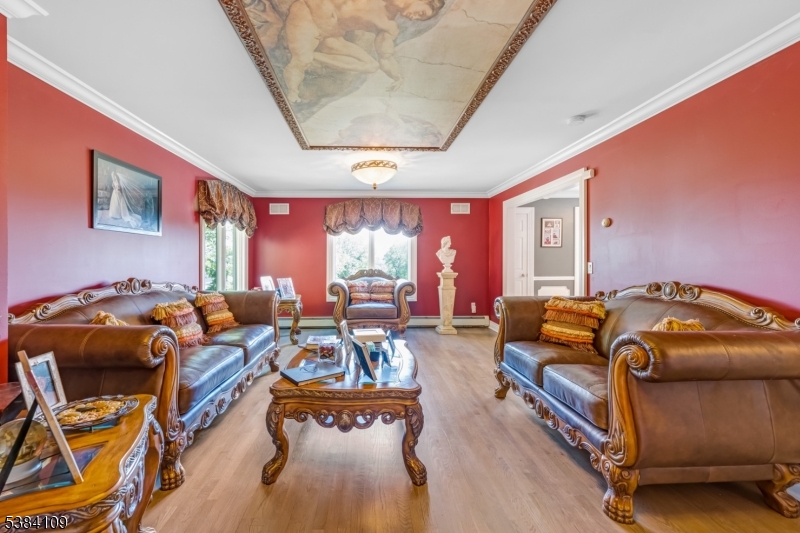 207 Eileen Drive Cedar Grove, NJ 07009 - Photo 2 of 26 a living room with furniture and a large window