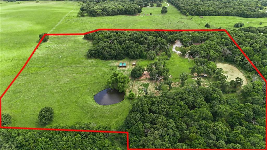 237 Brenda Lane Gainesville, TX 76240 - Photo 35 of 40 Expansive rural acreage featuring significant tree coverage and open pasture areas