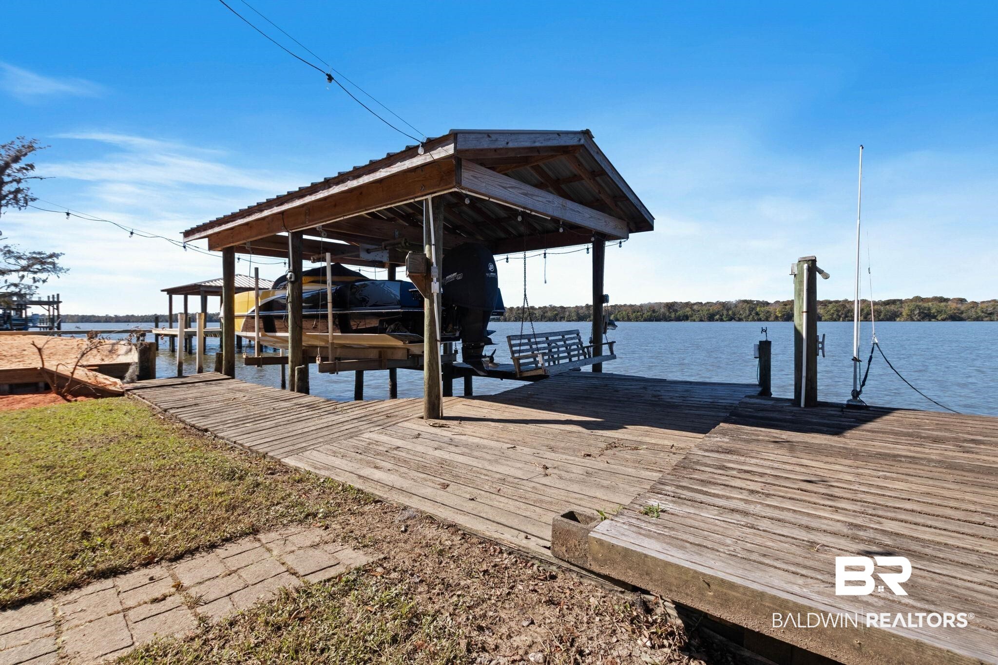 41997 Bayou Road Bay Minette, AL 36507 - Photo 57 of 68 Dock area featuring boat lift and a water view