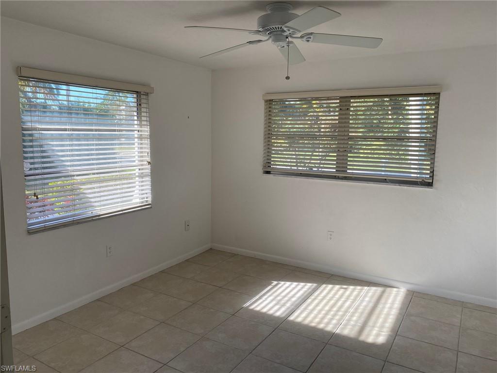 620 Orchid Drive Naples, FL 34102 - Photo 16 of 16 a view of an empty room with a window