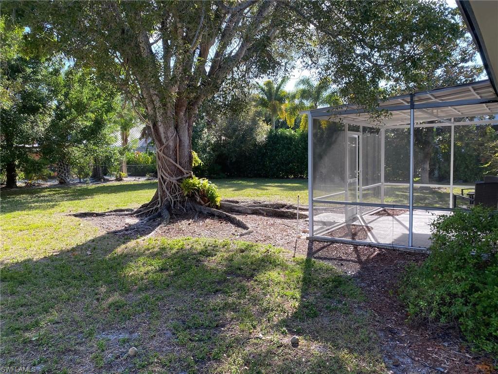 620 Orchid Drive Naples, FL 34102 - Photo 5 of 16 a view of a park with large trees