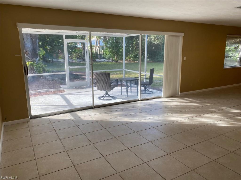 620 Orchid Drive Naples, FL 34102 - Photo 8 of 16 a view of empty room with window