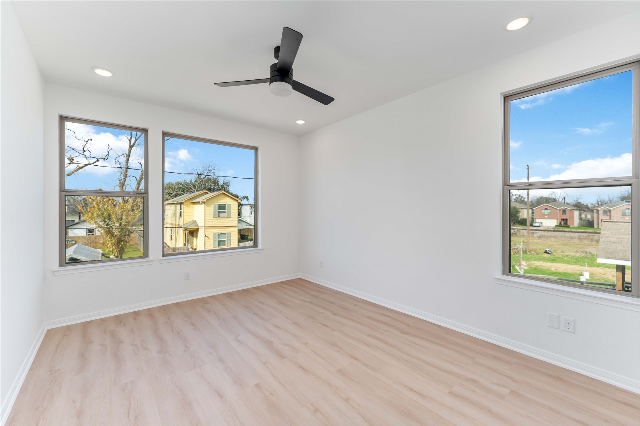 3508 Delhi Street Houston, TX 77022 - Photo 20 of 38 wooden floor in an empty room with a window