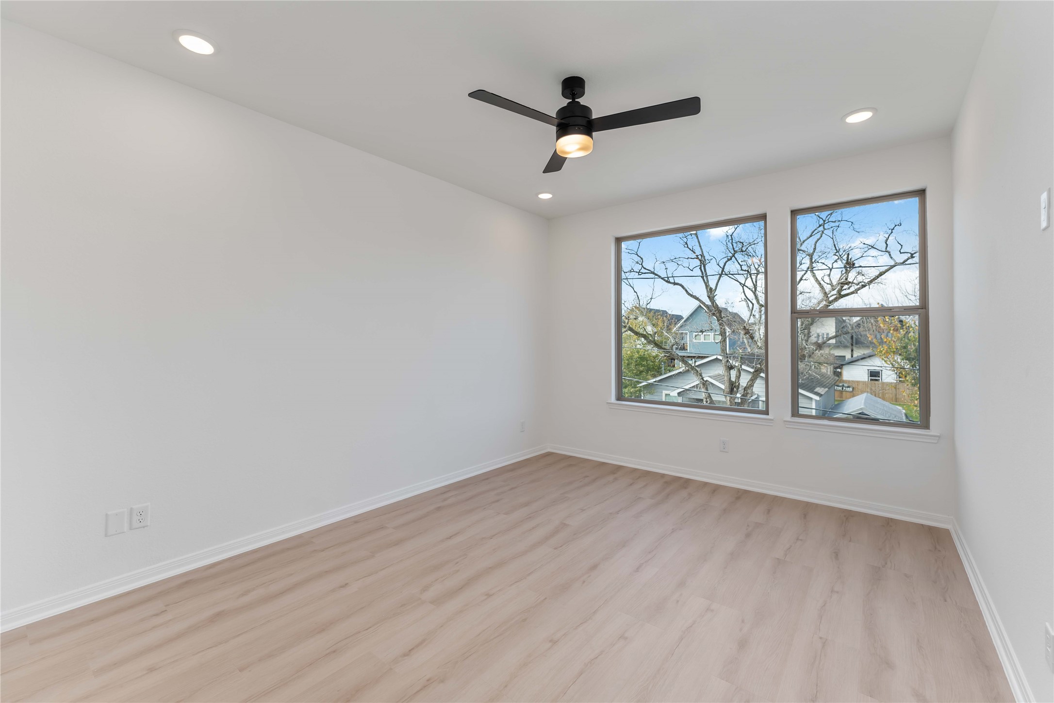 3508 Delhi Street Houston, TX 77022 - Photo 24 of 38 wooden floor in an empty room with a window