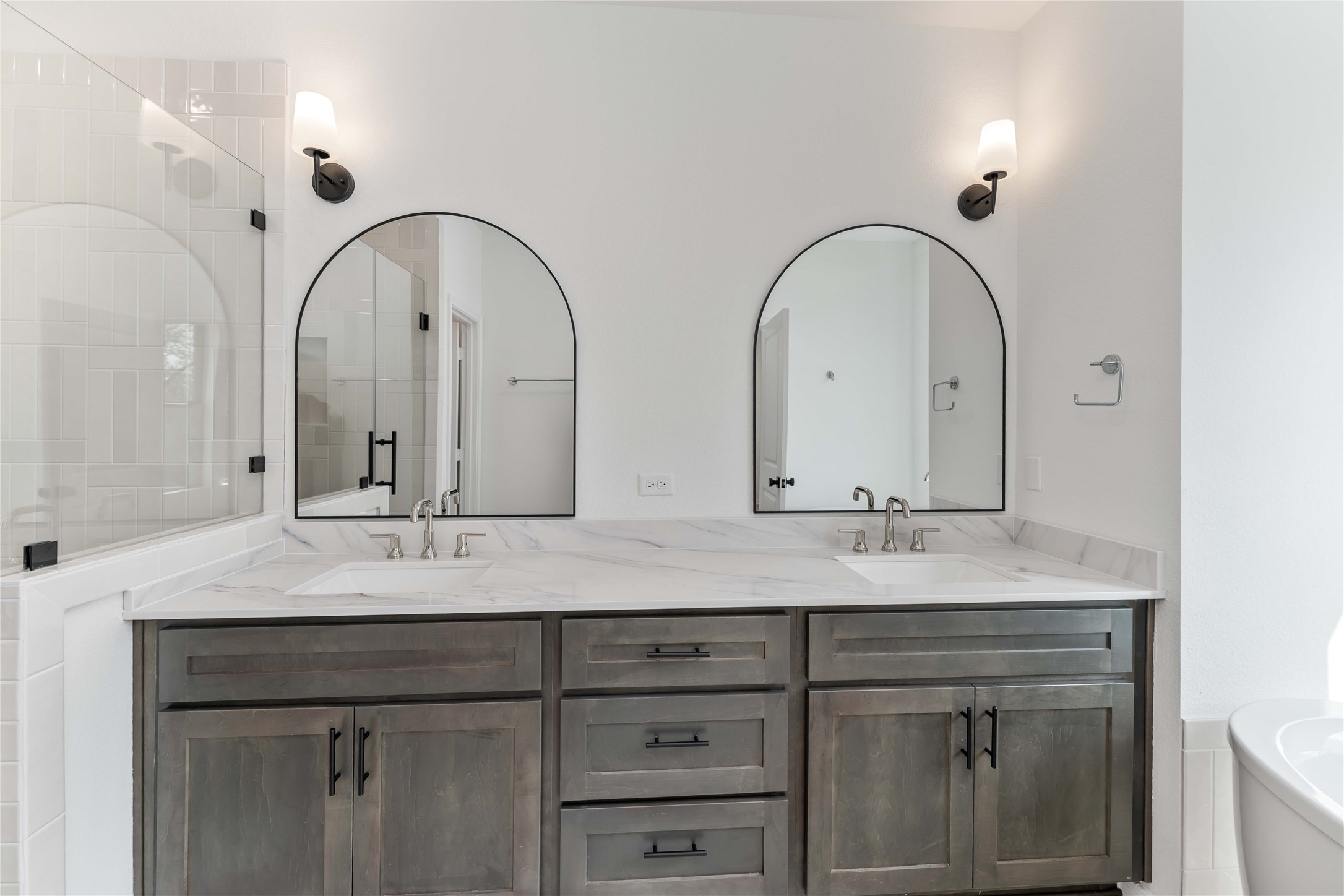 3508 Delhi Street Houston, TX 77022 - Photo 32 of 38 a bathroom with a double vanity sink and a mirror