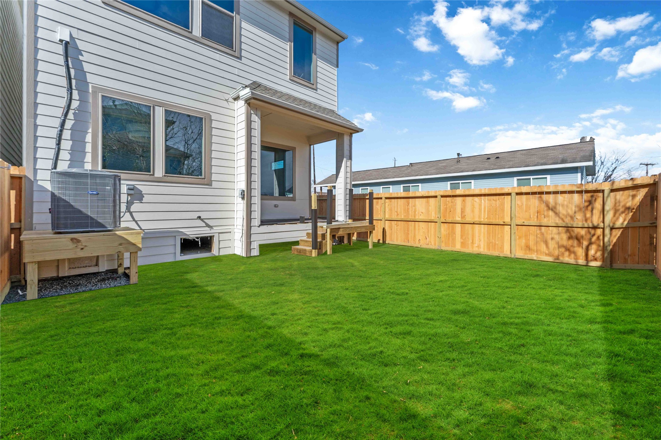 3508 Delhi Street Houston, TX 77022 - Photo 38 of 38 a backyard of a house with lots of green space