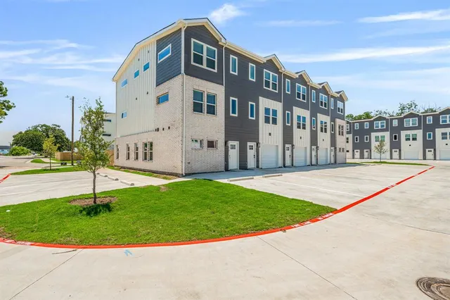 a view of building with yard