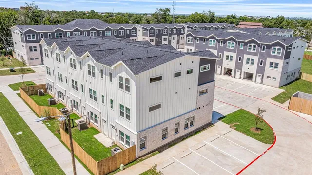an aerial view of a house with a garden