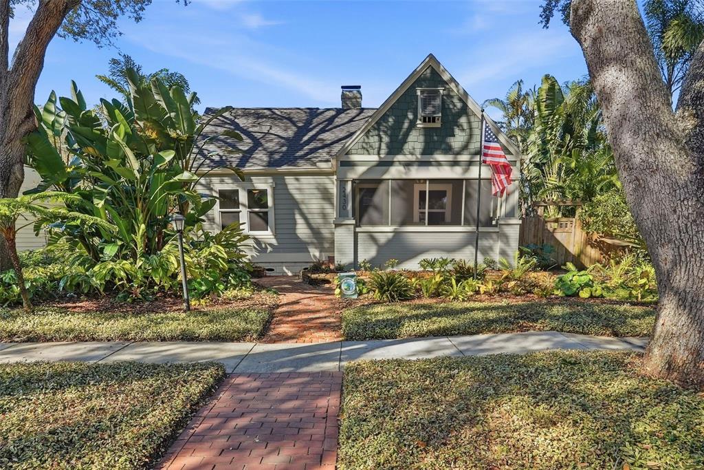 2430 14th Street North St. Petersburg, FL 33704 - Photo 1 of 1 front view of a house with a yard