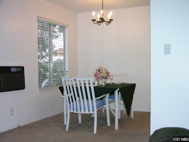 400 South Saliman Road, Unit 47 Carson City, NV 89701 - Photo 3 of 9 a view of a dining room with furniture window and outside view