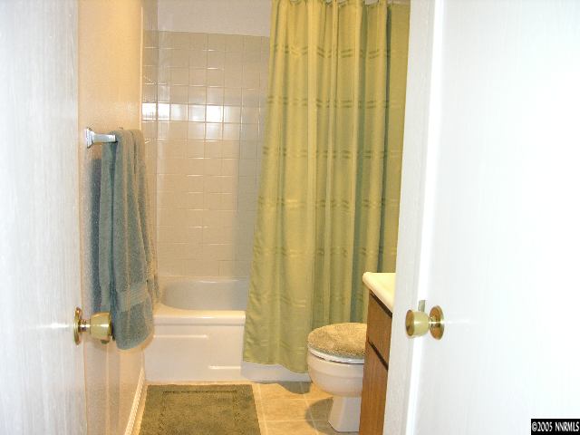 400 South Saliman Road, Unit 47 Carson City, NV 89701 - Photo 7 of 9 a bathroom with a shower and a toilet