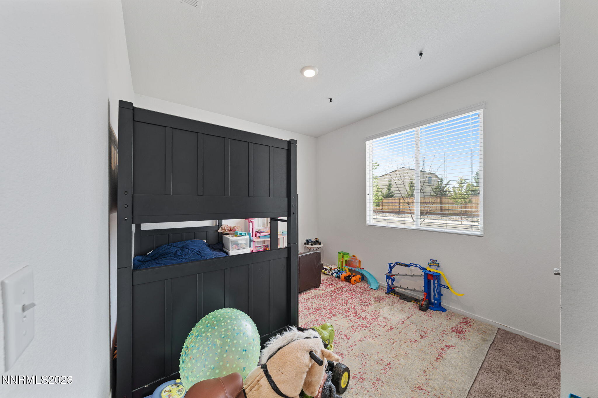 9708 Sea Glass Drive Reno, NV 89506 - Photo 9 of 51 a living room with furniture and a table