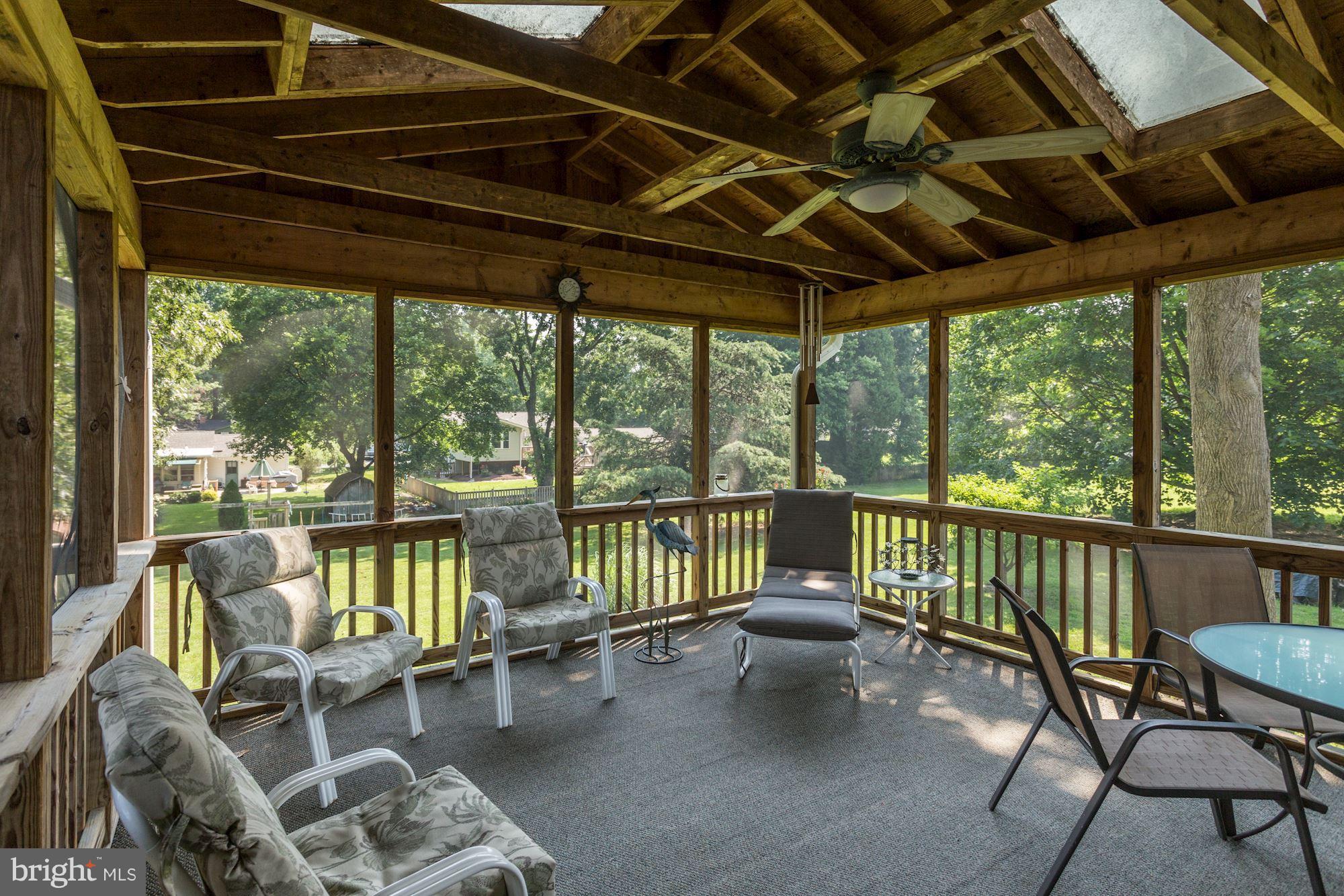 108 Claiborne Road Edgewater, MD 21037 - Photo 4 of 30 Large Screened In Porch - Perfect for Crab Feasts!