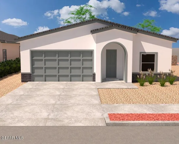 a view of a white house with a large space