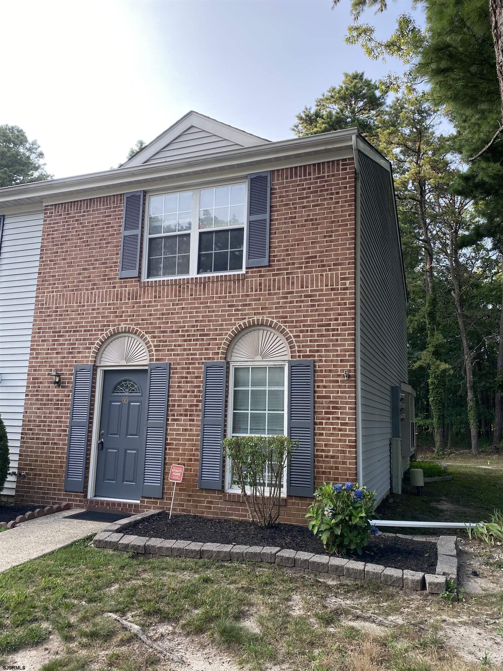 66 Shawnee Place, Unit 66 Galloway Township, NJ 08205 - Photo 1 of 20 a front view of a house