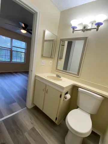 a bathroom with a tub and sink