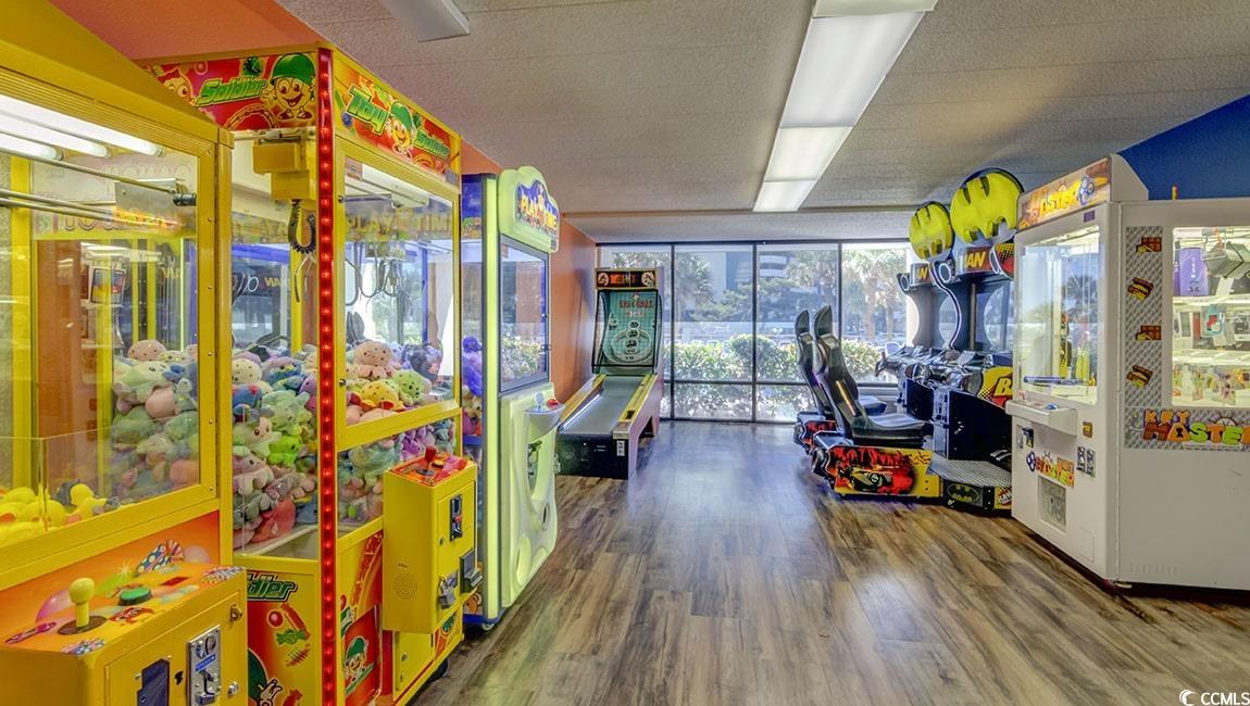7000 North Ocean Boulevard, Unit 129 Myrtle Beach, SC 29572 - Photo 14 of 27 Game room with a wall of windows