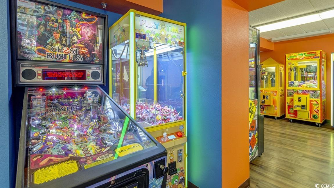 7000 North Ocean Boulevard, Unit 129 Myrtle Beach, SC 29572 - Photo 16 of 27 Game room featuring a textured wall