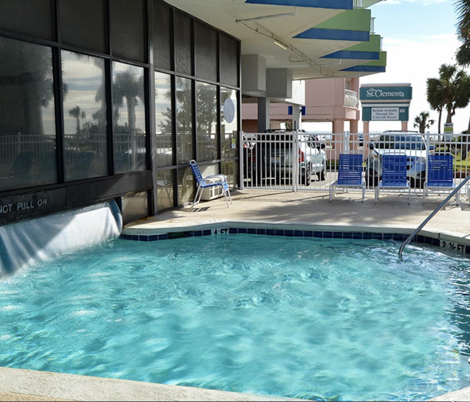 7000 North Ocean Boulevard, Unit 129 Myrtle Beach, SC 29572 - Photo 19 of 27 View of pool featuring a swimming pool