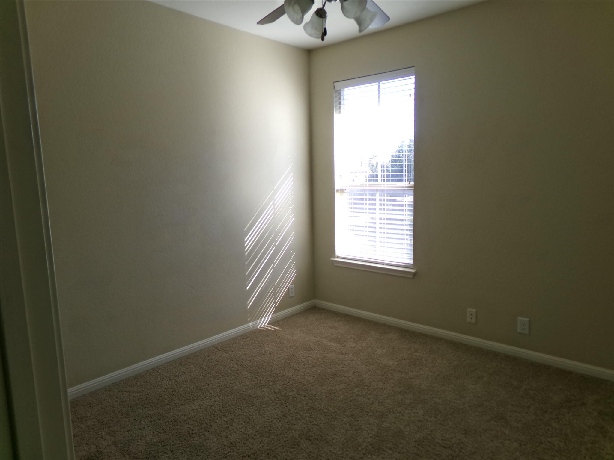 14001 Avery Ranch Boulevard, Unit 2103 Austin, TX 78717 - Photo 16 of 21 a view of an empty room with a window