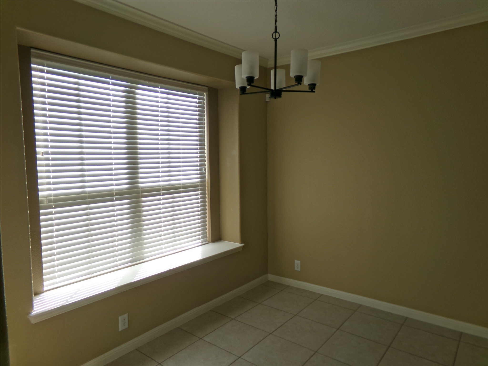 14001 Avery Ranch Boulevard, Unit 2103 Austin, TX 78717 - Photo 6 of 21 a view of a room with a window and brick walls