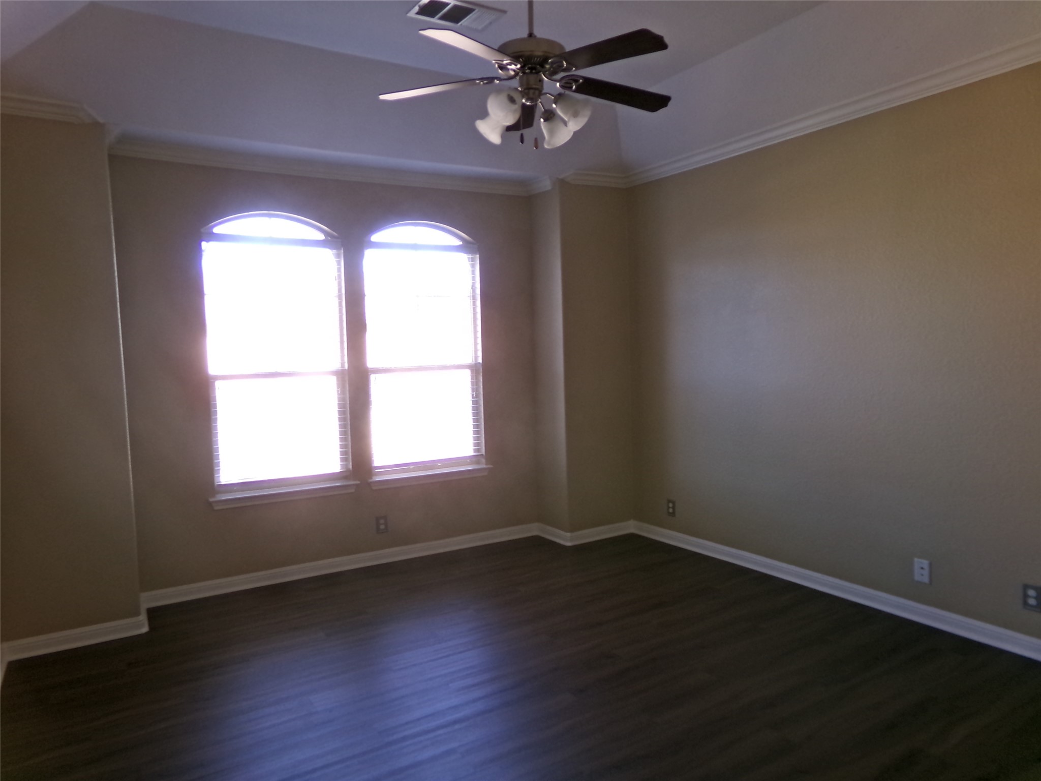 14001 Avery Ranch Boulevard, Unit 2103 Austin, TX 78717 - Photo 9 of 21 a view of an empty room with wooden floor and a window