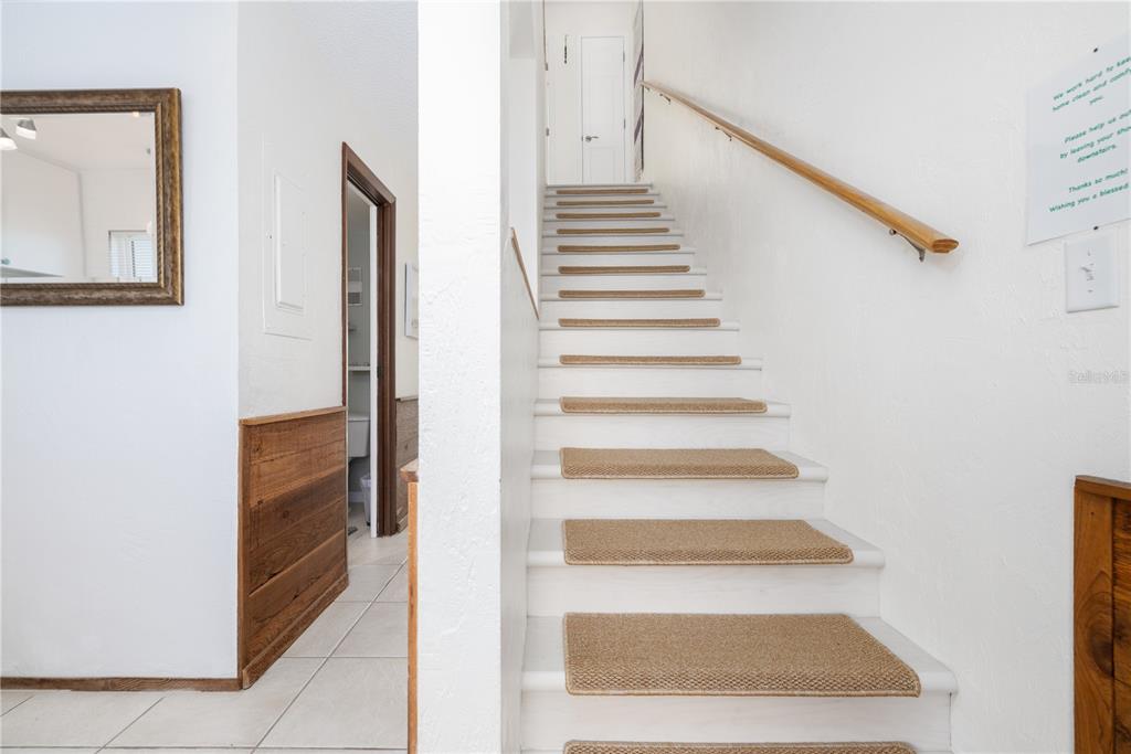 4786 South Atlantic Avenue, Unit B1 Ponce Inlet, FL 32127 - Photo 11 of 22 a view of an entryway with staircase
