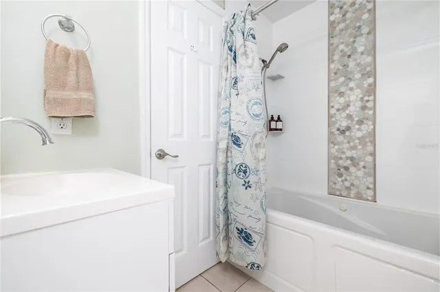 a bathroom with a sink double vanity and a mirror