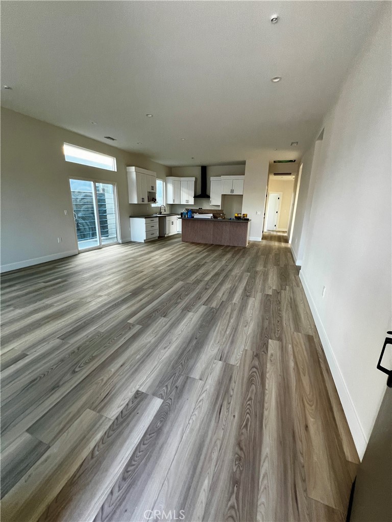 66231 3rd Street Desert Hot Springs, CA 92240 - Photo 2 of 13 a view of a living room hardwood and kitchen