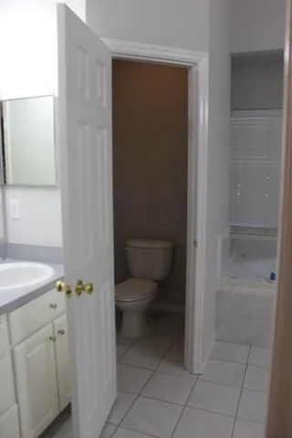 a empty room with a wooden door