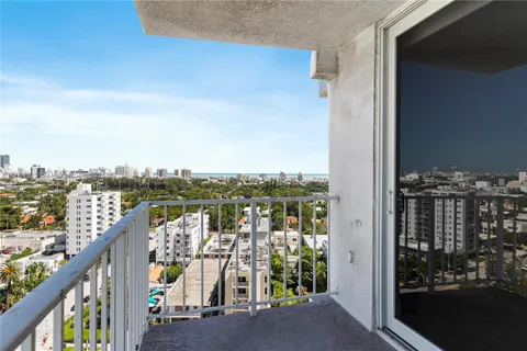 a view of a balcony with city