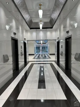 a view of a kitchen with a sink