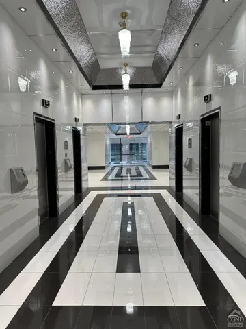 a view of a kitchen with a sink