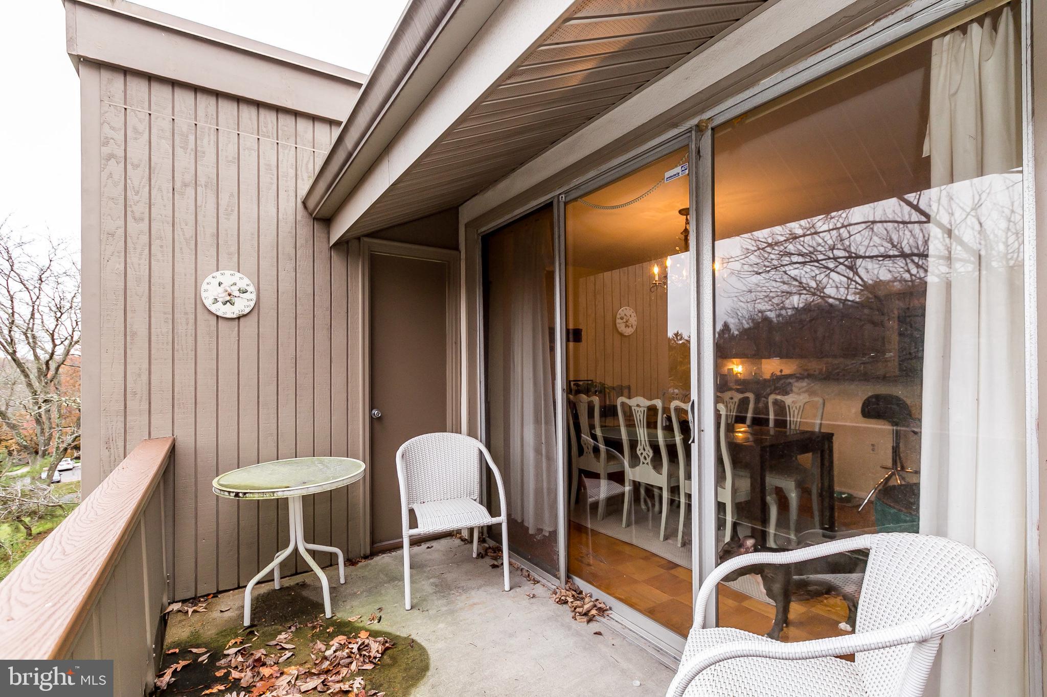 114 Cross Keys Road, Unit R114E Baltimore, MD 21210 - Photo 27 of 33 a house view with a outdoor seating space