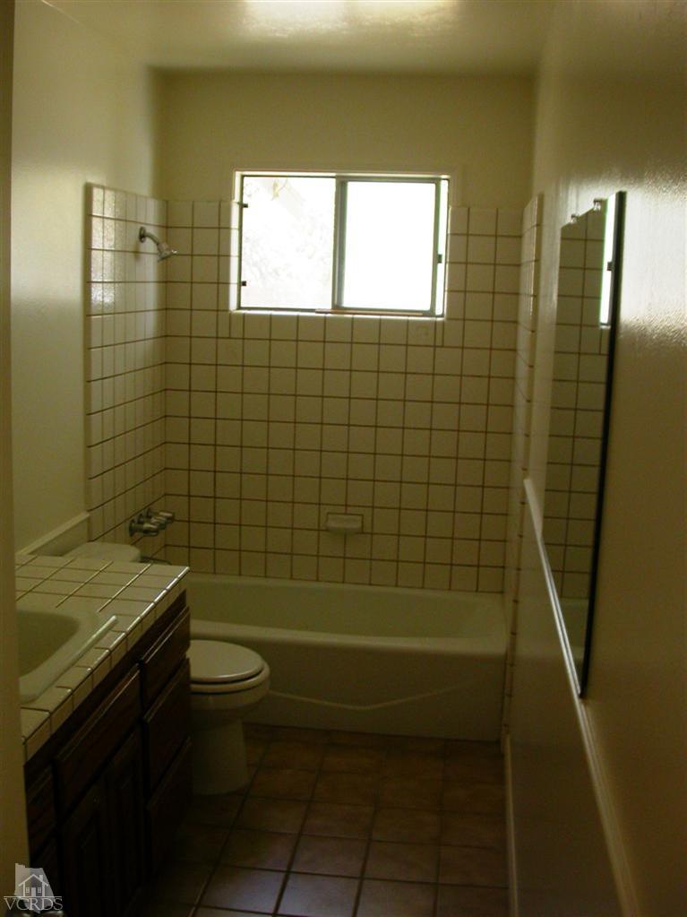 7248 Arthur Rondo Ventura, CA 93003 - Photo 13 of 28 a bathroom with a sink a toilet and shower