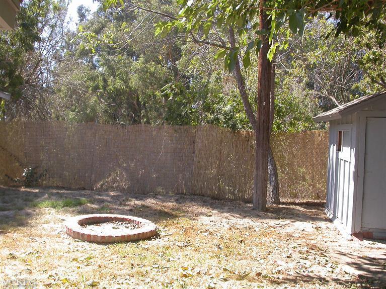 7248 Arthur Rondo Ventura, CA 93003 - Photo 22 of 28 a backyard of a house with trees
