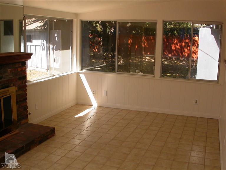 7248 Arthur Rondo Ventura, CA 93003 - Photo 9 of 28 a view of entryway with a floor to ceiling window and a kitchen