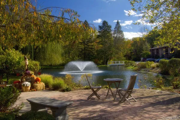 a view of a chairs and tables in the patio