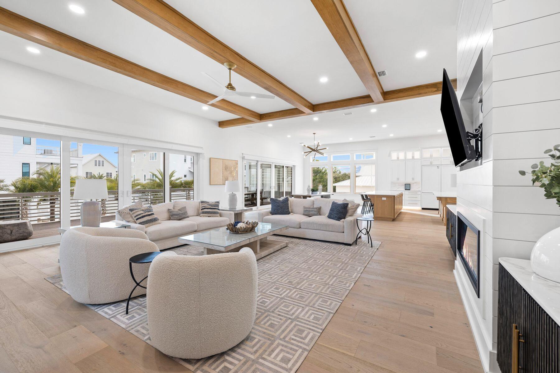 311 Walton Rose Ln Inlet Beach Inlet Beach, FL 32461 - Photo 17 of 93 a living room with couches and a large mirror with wooden floor