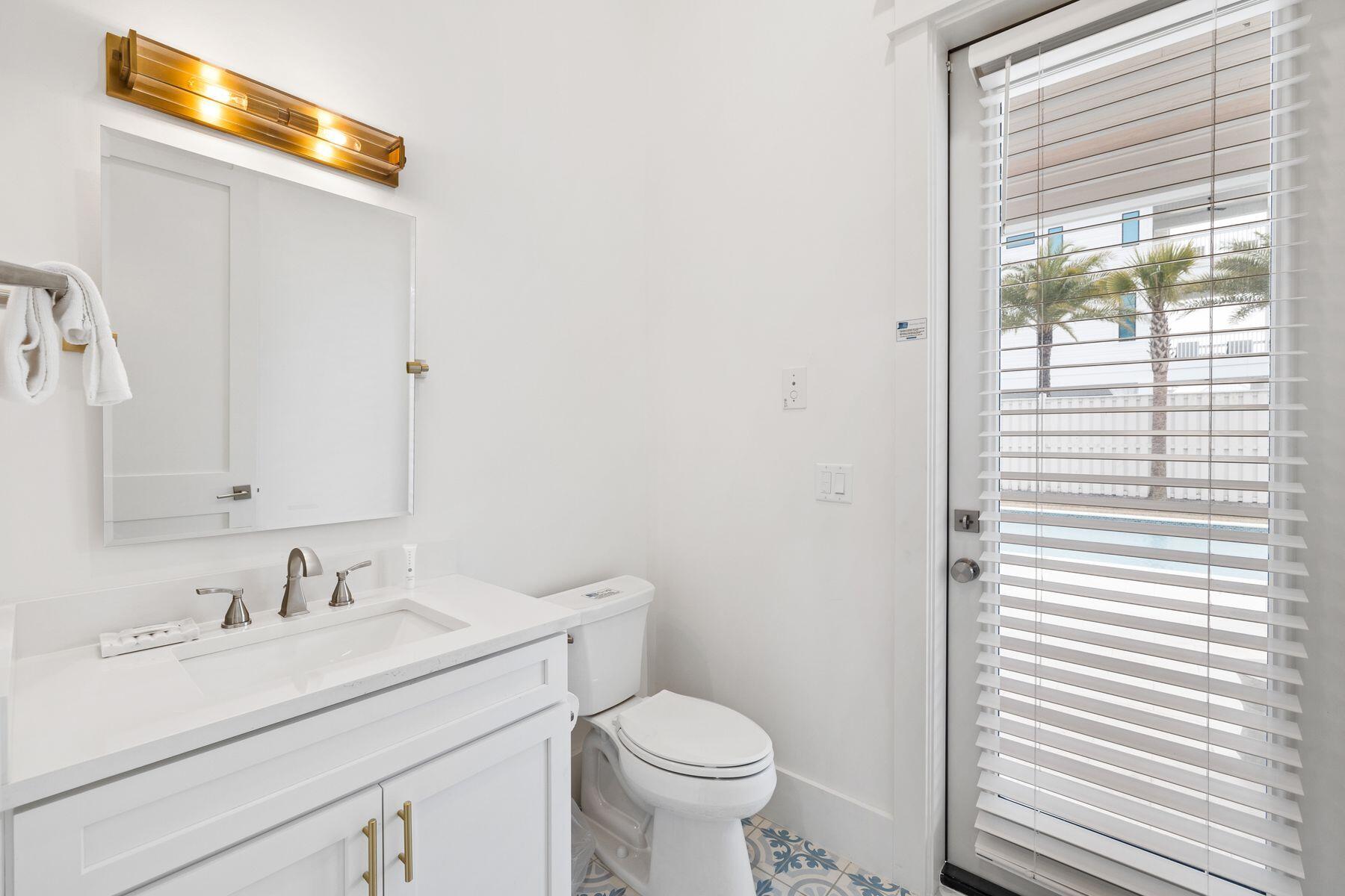 311 Walton Rose Ln Inlet Beach Inlet Beach, FL 32461 - Photo 33 of 93 a bathroom with a sink and a toilet