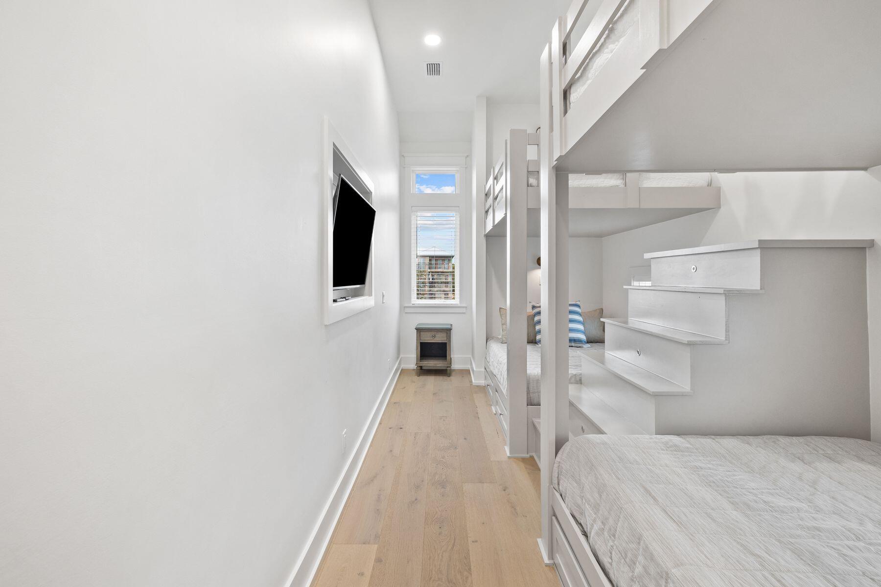 311 Walton Rose Ln Inlet Beach Inlet Beach, FL 32461 - Photo 45 of 93 a view of a hallway with wooden floor and entryway