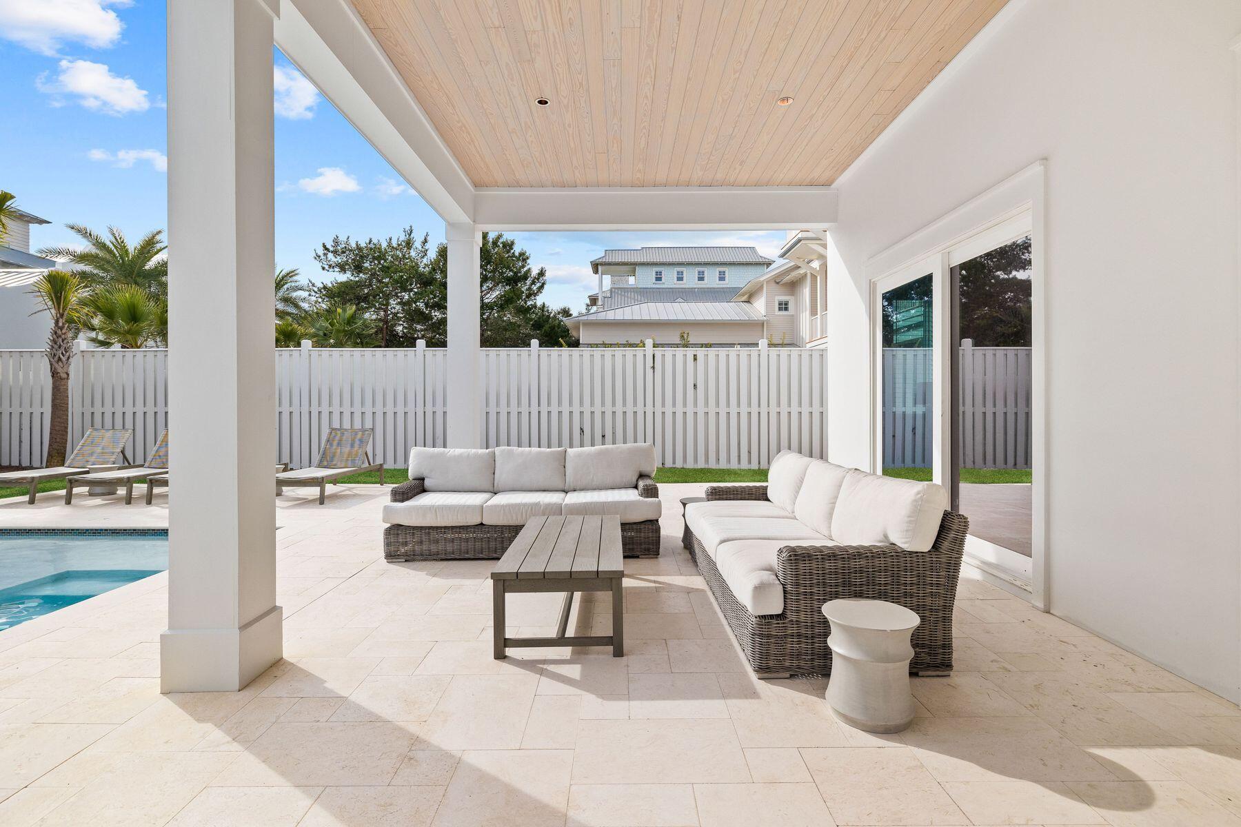 311 Walton Rose Ln Inlet Beach Inlet Beach, FL 32461 - Photo 78 of 93 a outdoor space with patio the couches and a dining table with garden view