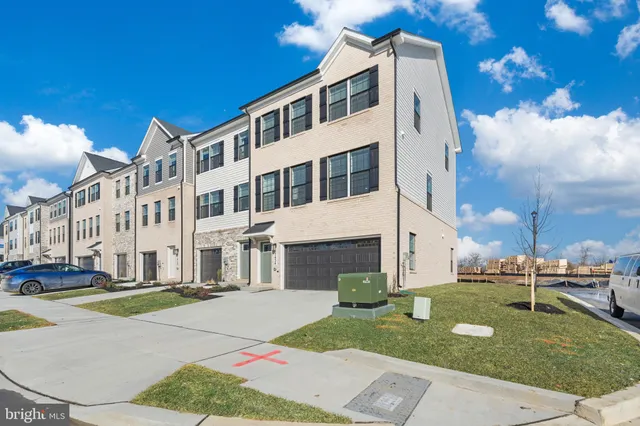 a front view of a building with garden