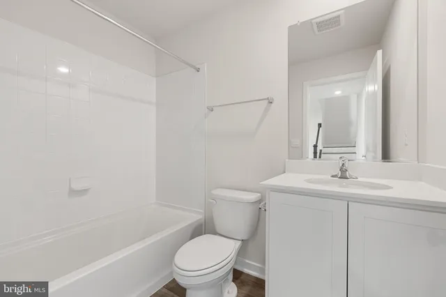 a view of a room that has a window in it