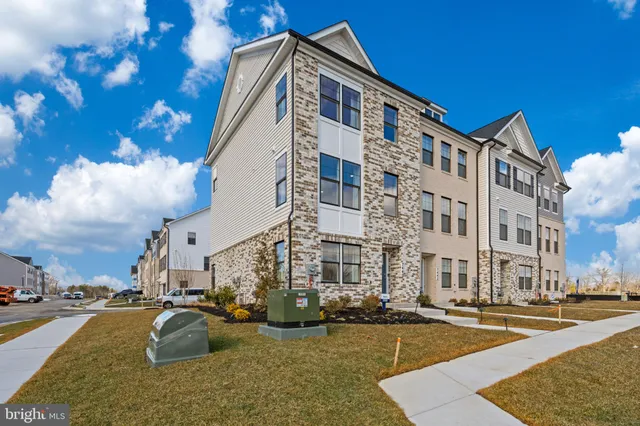 a front view of a building with street view