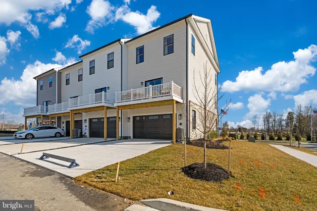 a front view of a house with swimming pool