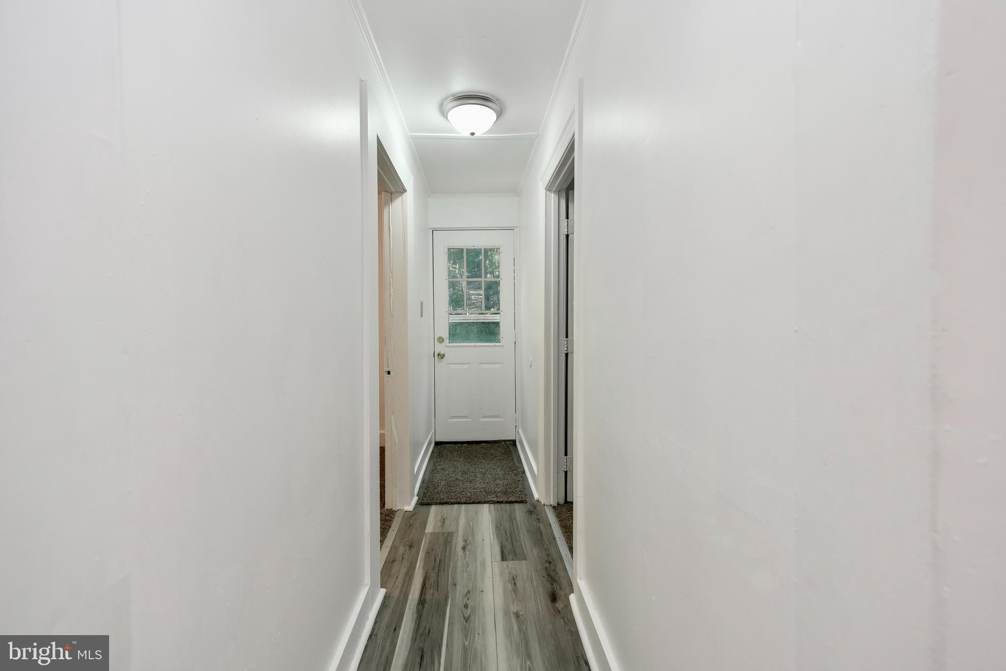 19086 Windsor Road Triangle, VA 22172 - Photo 3 of 9 a view of a room with wooden floor