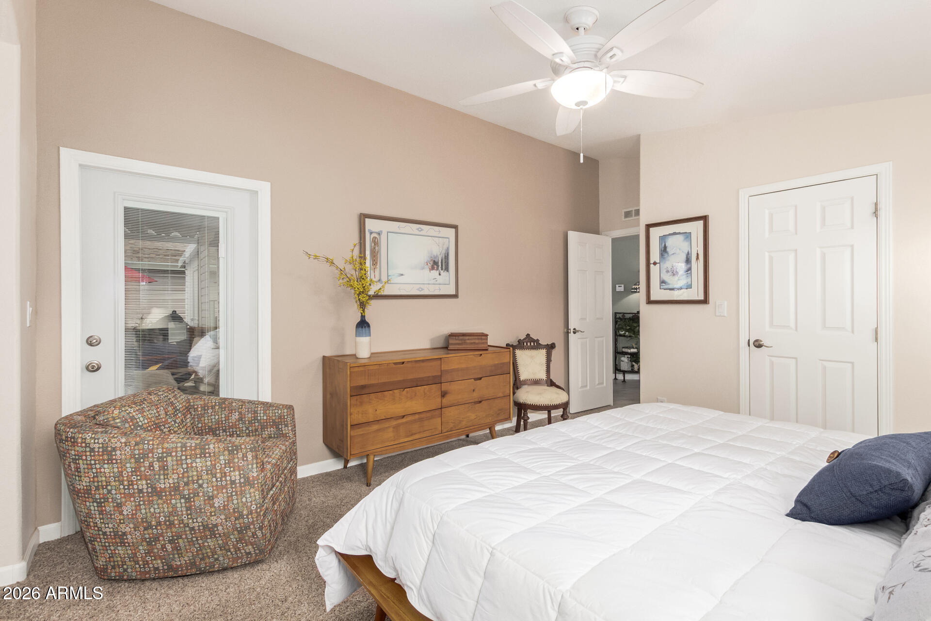 3301 South Goldfield Road, Unit 2004 Apache Junction, AZ 85119 - Photo 22 of 40 a bedroom with a bed and closet